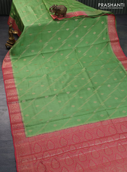 Chiniya silk saree light green and pink with allover zari weaves and zari woven border