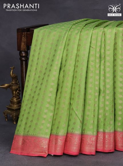 Chiniya silk saree light green and pink shade with allover zari woven buttas weaves and zari woven border