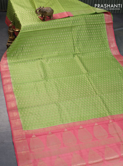 Chiniya silk saree light green and pink shade with allover zari woven buttas weaves and zari woven border