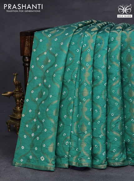 Chiniya silk saree teal green and navy blue with allover zari weaves & bandhani prints and zari woven piping border