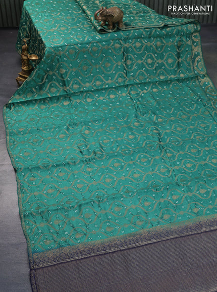 Chiniya silk saree teal green and navy blue with allover zari weaves & bandhani prints and zari woven piping border