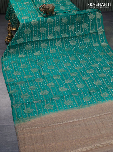 Chiniya silk saree teal green and grey shade with allover zari weaves & bandhani prints in boderless style