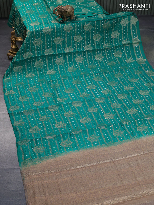 Chiniya silk saree teal green and grey shade with allover zari weaves & bandhani prints in boderless style