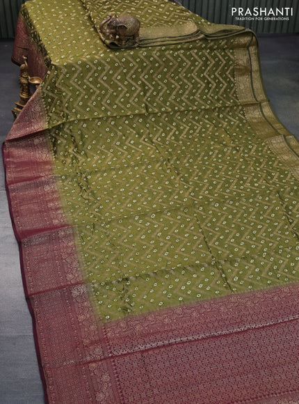 Chiniya silk saree sap green and wine shade with allover zari weaves & bandhani prints and long zari woven border