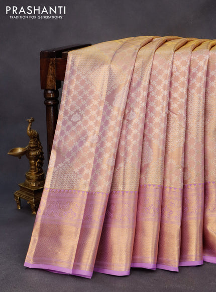 Kanchipuram tissue silk saree dual shade of gold and lavender shade with allover silver zari woven brocade weaves and long zari woven border