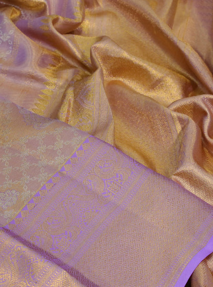 Kanchipuram tissue silk saree dual shade of gold and lavender shade with allover silver zari woven brocade weaves and long zari woven border