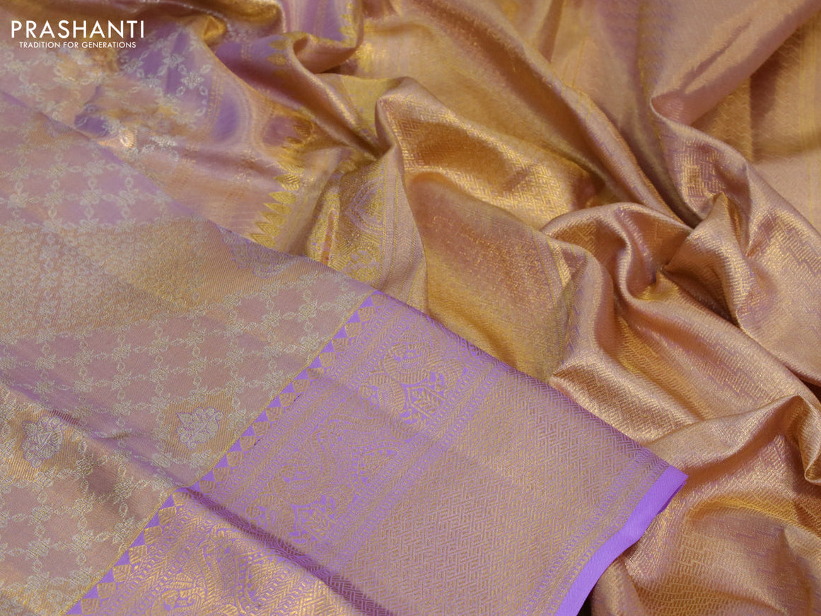 Kanchipuram tissue silk saree dual shade of gold and lavender shade with allover silver zari woven brocade weaves and long zari woven border