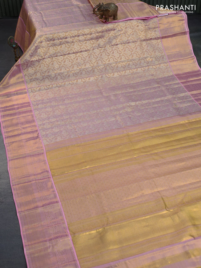 Kanchipuram tissue silk saree dual shade of gold and light pink with allover silver zari woven brocade weaves and long zari woven border