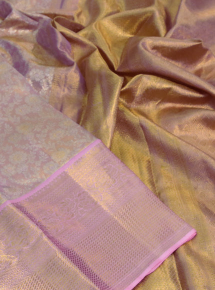 Kanchipuram tissue silk saree dual shade of gold and light pink with allover silver zari woven brocade weaves and long zari woven border