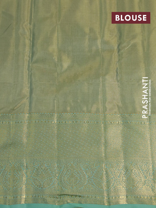 Kanchipuram tissue silk saree dual shade of pastel green with allover silver zari woven brocade weaves and long zari woven border