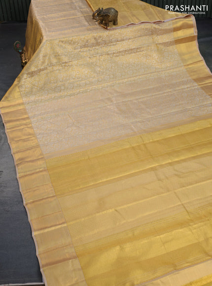 Kanchipuram tissue silk saree gold with allover silver zari woven brocade weaves and zari woven border