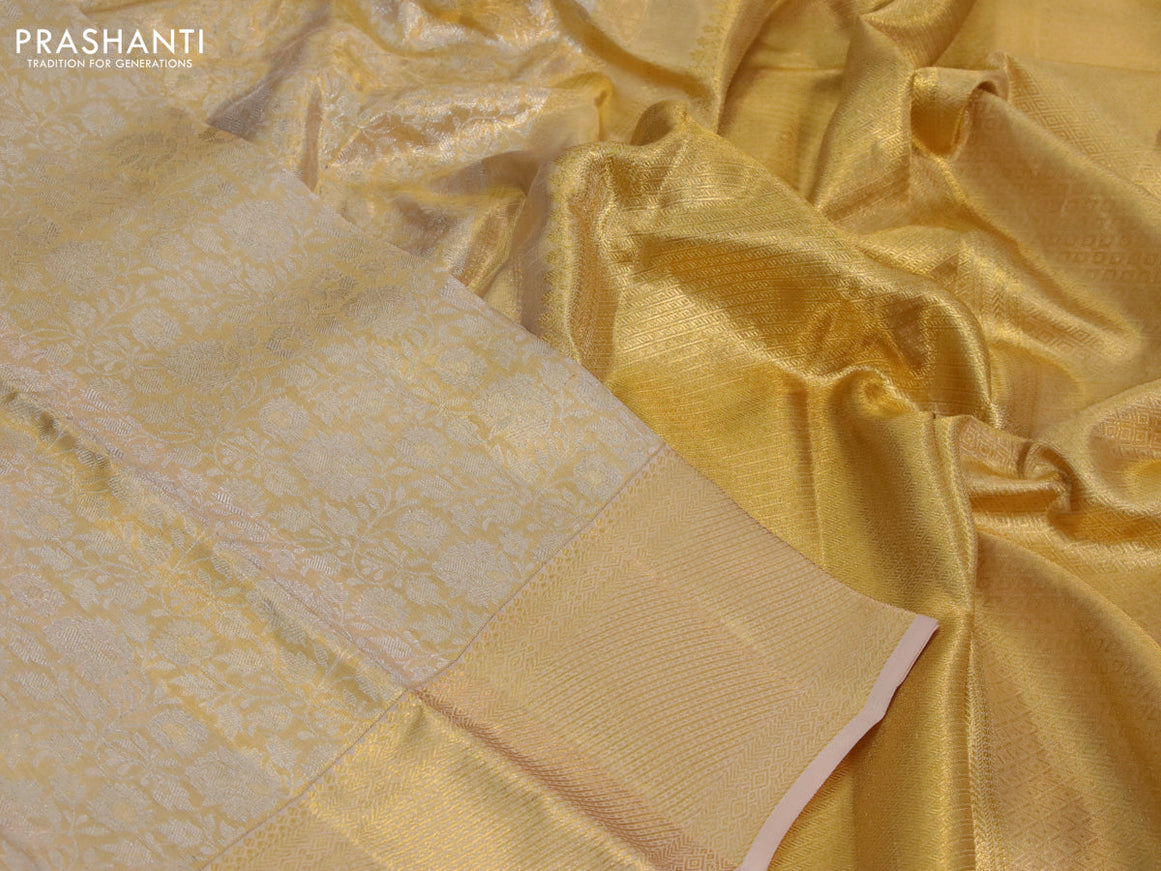 Kanchipuram tissue silk saree gold with allover silver zari woven brocade weaves and zari woven border