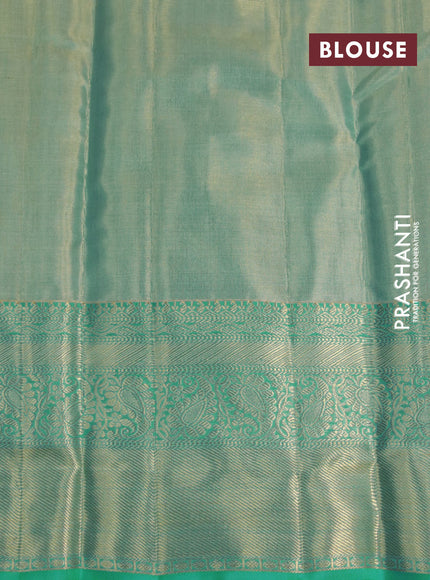 Kanchipuram tissue silk saree dual shade of teal with allover silver zari woven brocade weaves and long zari woven border