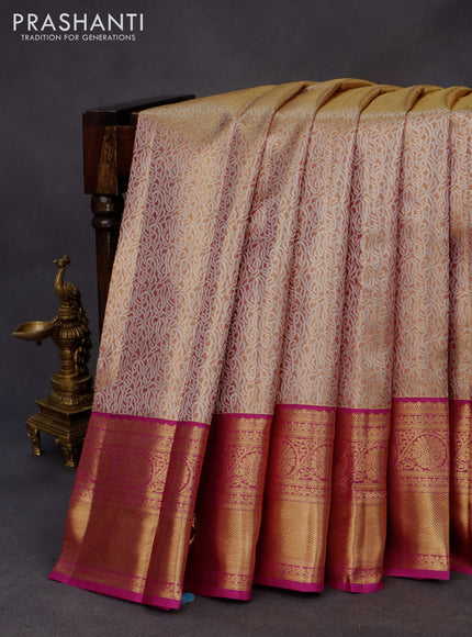 Kanchipuram tissue silk saree dual shade of gold and purple with allover silver zari woven brocade weaves and long zari woven border