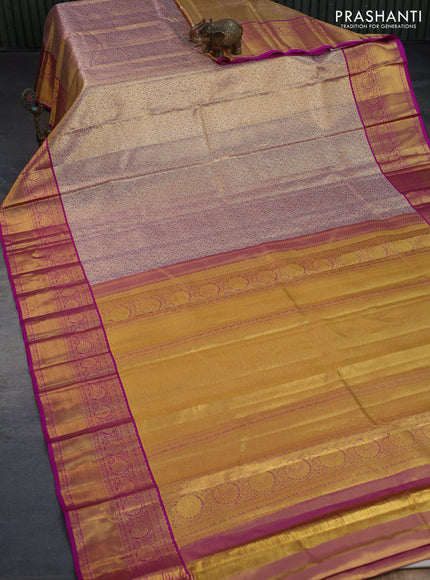 Kanchipuram tissue silk saree dual shade of gold and purple with allover silver zari woven brocade weaves and long zari woven border