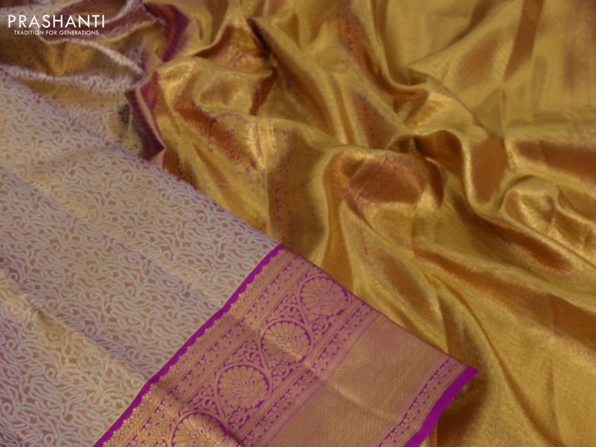 Kanchipuram tissue silk saree dual shade of gold and purple with allover silver zari woven brocade weaves and long zari woven border