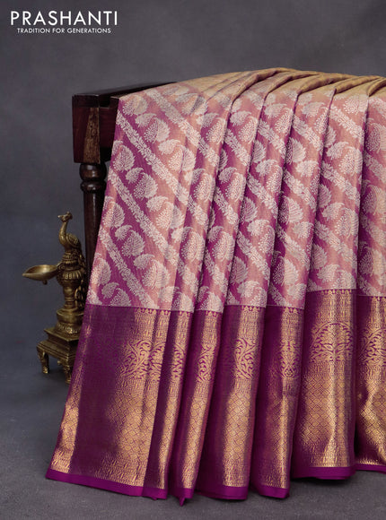 Kanchipuram tissue silk saree dual shade of gold and purple with allover zari woven brocade weaves and long zari woven border