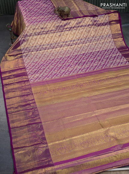 Kanchipuram tissue silk saree dual shade of gold and purple with allover zari woven brocade weaves and long zari woven border