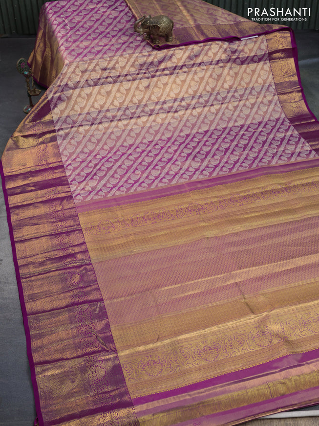 Kanchipuram tissue silk saree dual shade of gold and purple with allover zari woven brocade weaves and long zari woven border