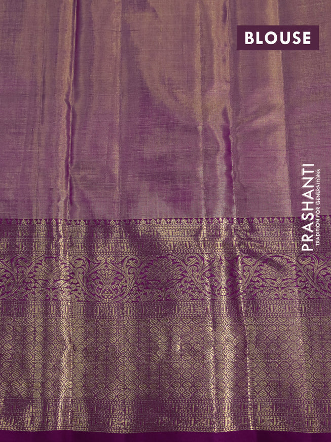 Kanchipuram tissue silk saree dual shade of gold and purple with allover zari woven brocade weaves and long zari woven border