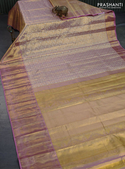 Kanchipuram tissue silk saree dual shade of gold and pastel pink with allover silver zari woven brocade weaves and long zari woven border