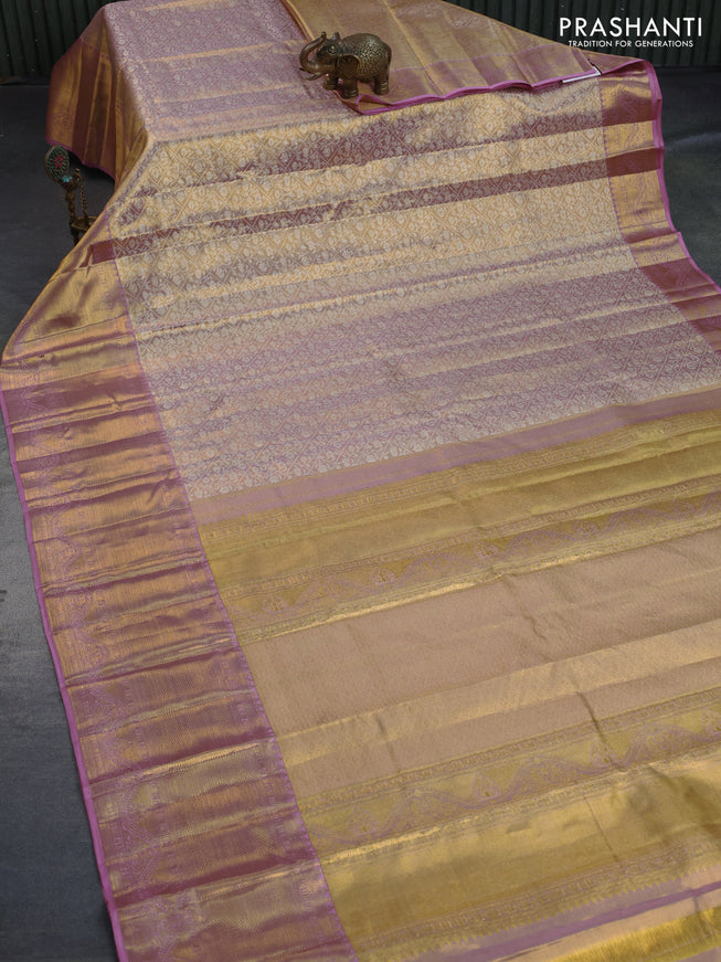 Kanchipuram tissue silk saree dual shade of gold and pastel pink with allover silver zari woven brocade weaves and long zari woven border