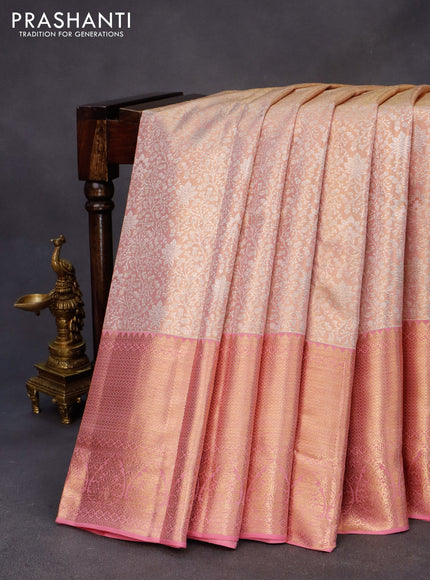 Kanchipuram tissue silk saree dual shade of peach and light pink with allover silver zari woven brocade weaves and long zari woven border