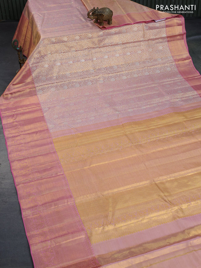 Kanchipuram tissue silk saree dual shade of peach and light pink with allover silver zari woven brocade weaves and long zari woven border