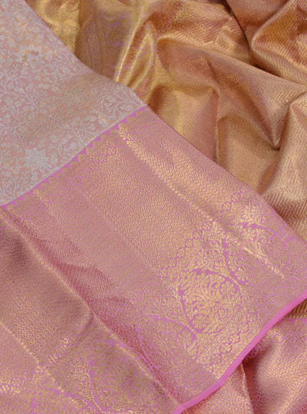 Kanchipuram tissue silk saree dual shade of peach and light pink with allover silver zari woven brocade weaves and long zari woven border