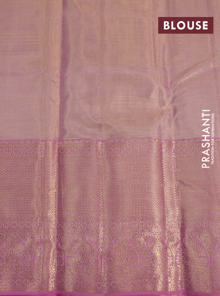 Kanchipuram tissue silk saree dual shade of peach and light pink with allover silver zari woven brocade weaves and long zari woven border