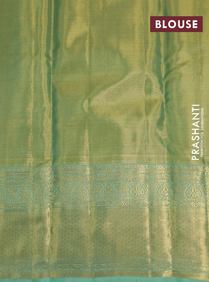 Kanchipuram tissue silk saree dual shade of teal green with allover silver zari woven brocade weaves and zari woven border