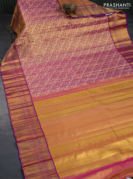 Kanchipuram tissue silk saree dual shade of pinkish gold and purple with allover silver zari woven brocade weaves and zari woven border