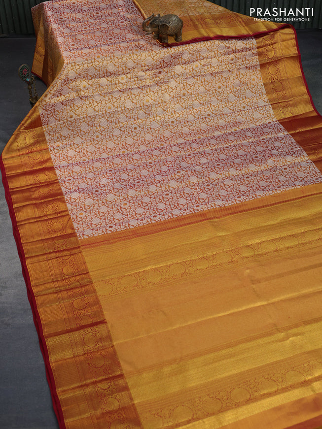 Kanchipuram tissue silk saree dual shade of gold and maroon with allover silver zari woven brocade weaves and zari woven border