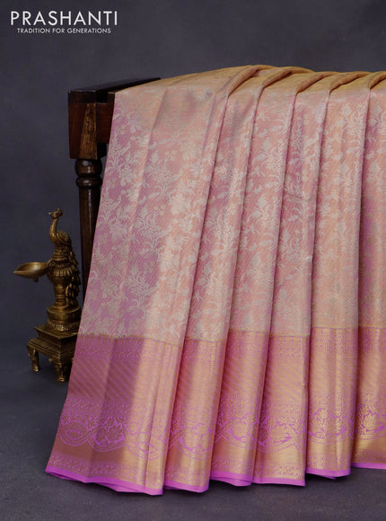 Kanchipuram tissue silk saree dual shade of gold and light pink with allover silver zari woven brocade weaves and zari woven border