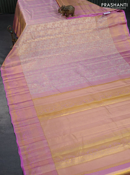 Kanchipuram tissue silk saree dual shade of gold and light pink with allover silver zari woven brocade weaves and zari woven border