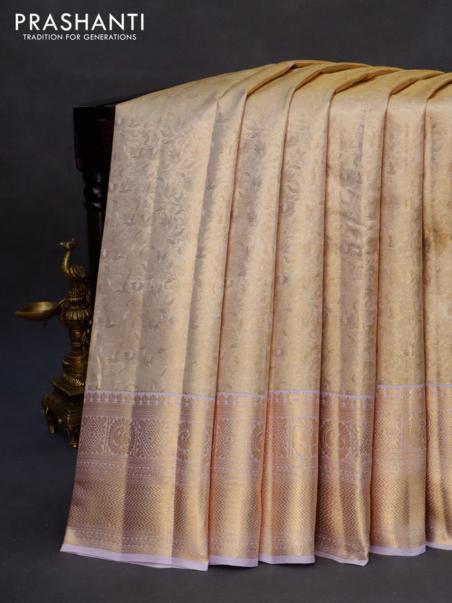 Kanchipuram tissue silk saree dual shade of gold and lavender shade with allover silver zari woven brocade weaves and zari woven border