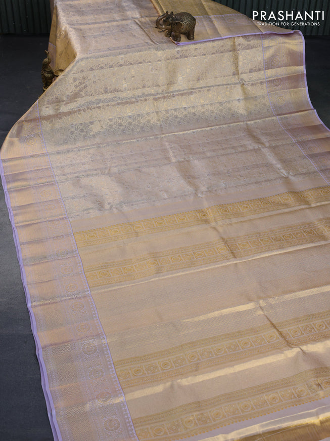 Kanchipuram tissue silk saree dual shade of gold and lavender shade with allover silver zari woven brocade weaves and zari woven border