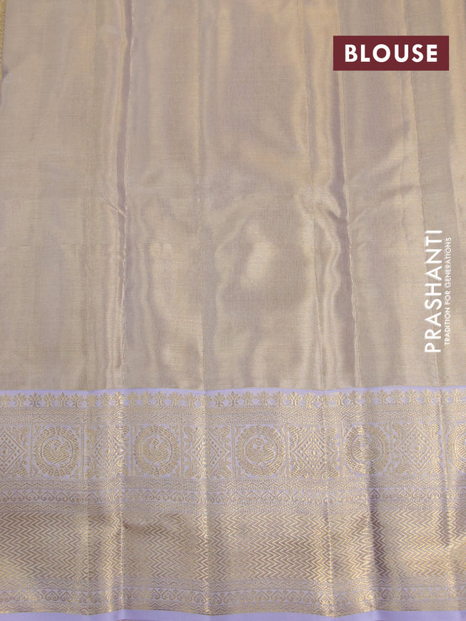 Kanchipuram tissue silk saree dual shade of gold and lavender shade with allover silver zari woven brocade weaves and zari woven border