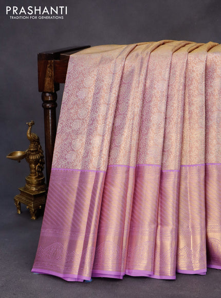 Kanchipuram tissue silk saree dual shade of gold and lavender shade with allover zari woven brocade weaves and long zari woven border