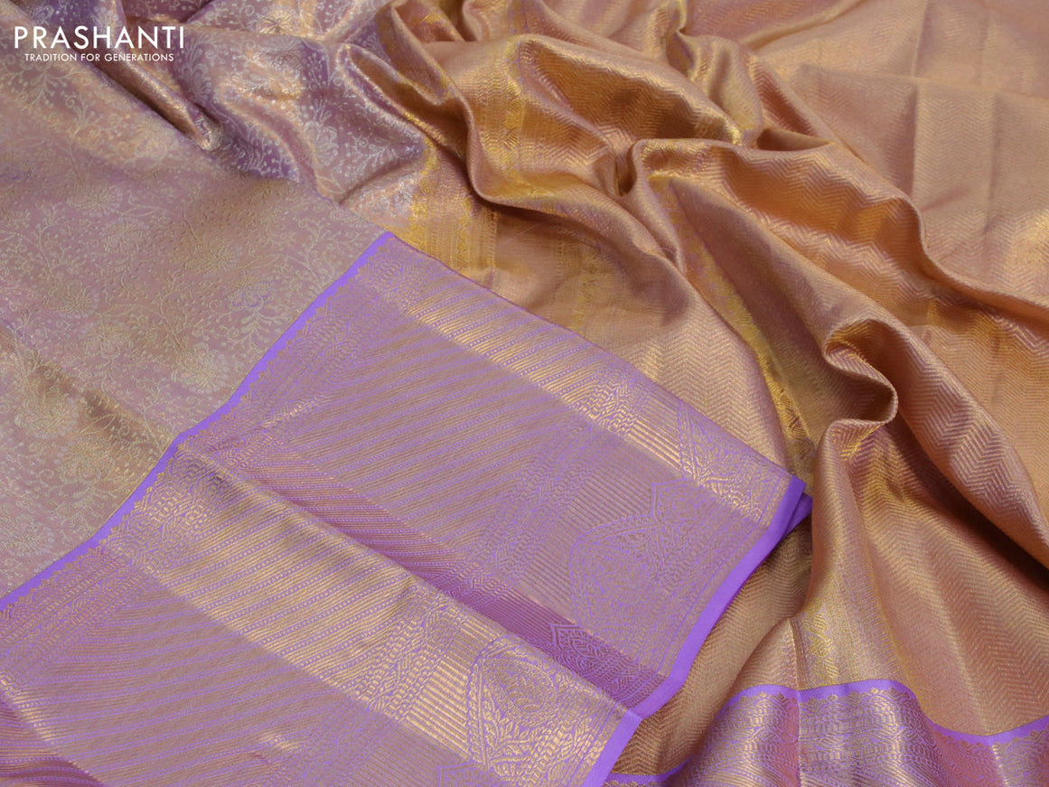 Kanchipuram tissue silk saree dual shade of gold and lavender shade with allover zari woven brocade weaves and long zari woven border