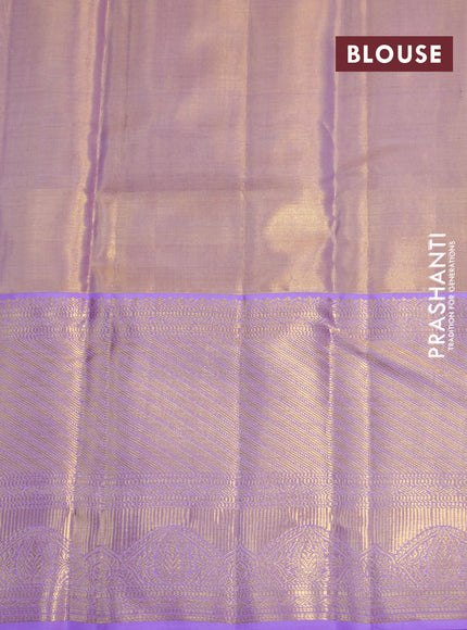 Kanchipuram tissue silk saree dual shade of gold and lavender shade with allover zari woven brocade weaves and long zari woven border