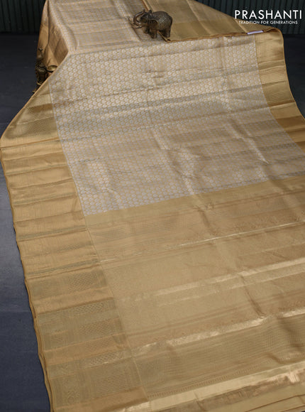 Kanchipuram tissue silk saree sandal with allover silver zari woven brocade weaves and long zari woven border