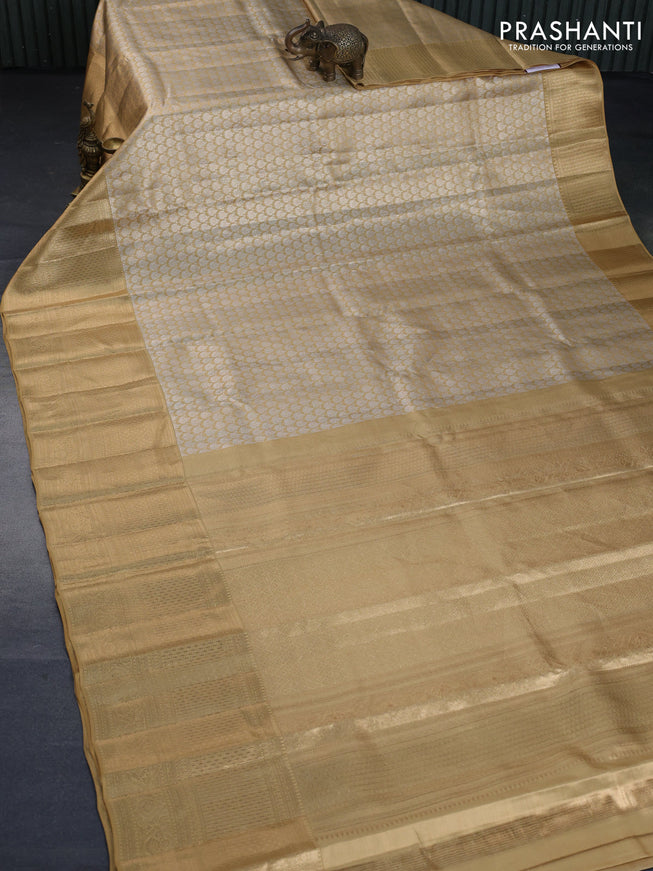 Kanchipuram tissue silk saree sandal with allover silver zari woven brocade weaves and long zari woven border