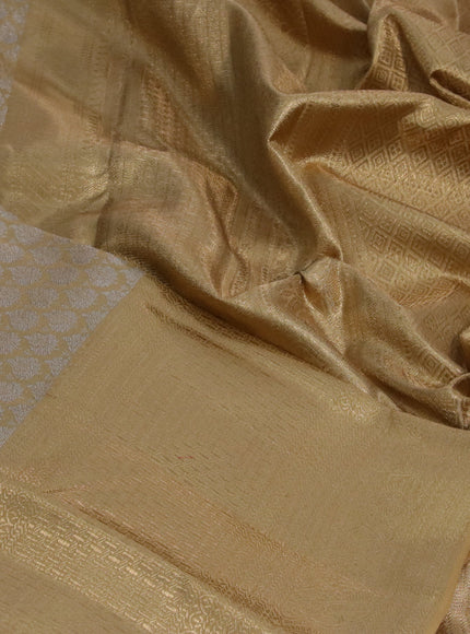 Kanchipuram tissue silk saree sandal with allover silver zari woven brocade weaves and long zari woven border