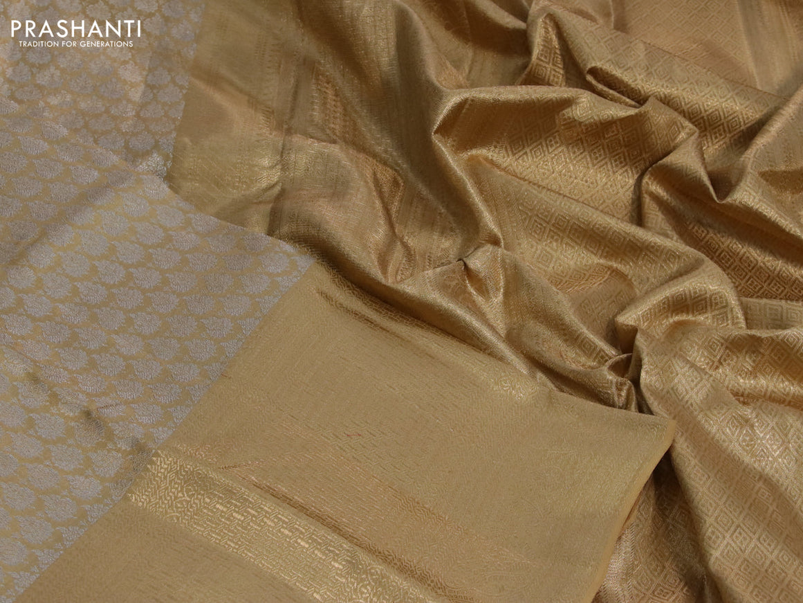 Kanchipuram tissue silk saree sandal with allover silver zari woven brocade weaves and long zari woven border