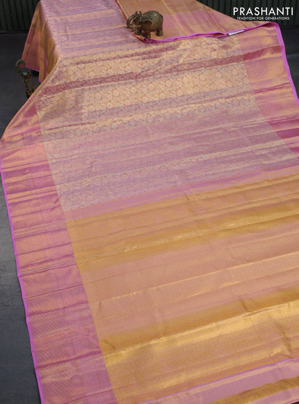 Kanchipuram tissue silk saree dual shade of light pink with allover silver zari woven brocade weaves and zari woven border