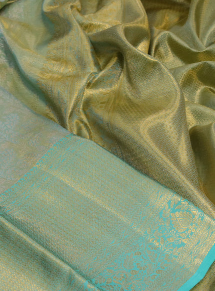 Kanchipuram tissue silk saree dual shade of teal blue with allover silver zari woven brocade weaves and long zari woven border