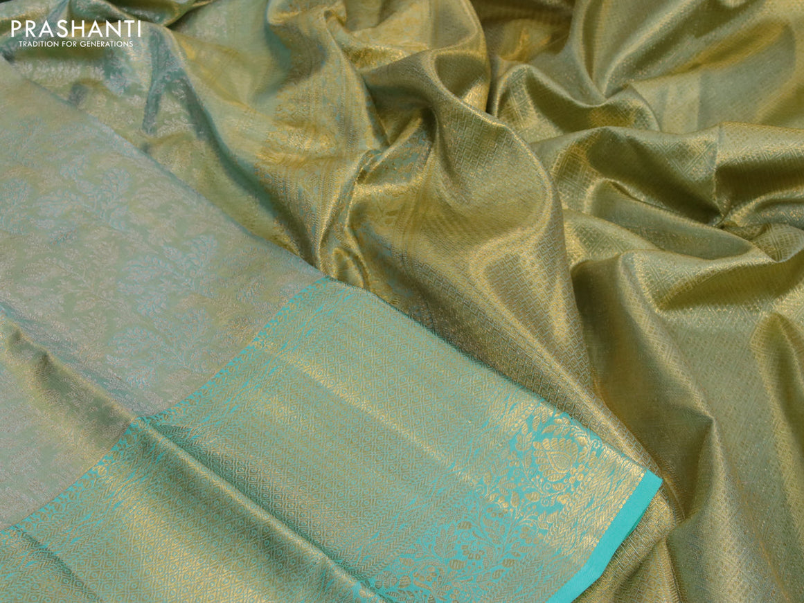 Kanchipuram tissue silk saree dual shade of teal blue with allover silver zari woven brocade weaves and long zari woven border