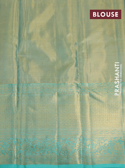 Kanchipuram tissue silk saree dual shade of teal blue with allover silver zari woven brocade weaves and long zari woven border