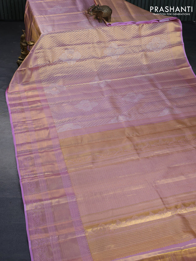 Kanchipuram tissue silk saree dual shade of lavender with allover silver zari woven brocade weaves and long zari woven border